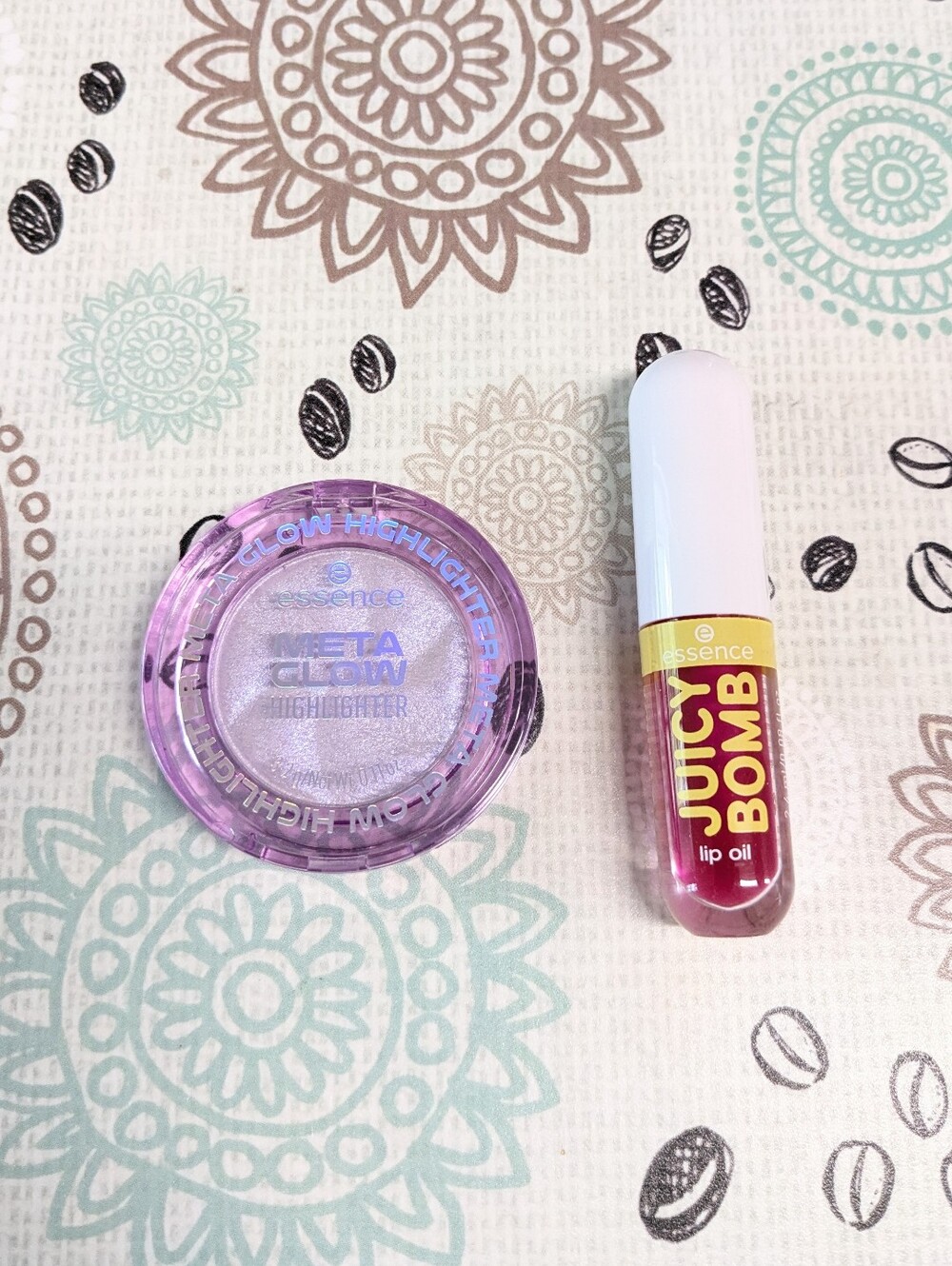 Essence Meta Glow Highlighter and Juicy Lip Oil duo